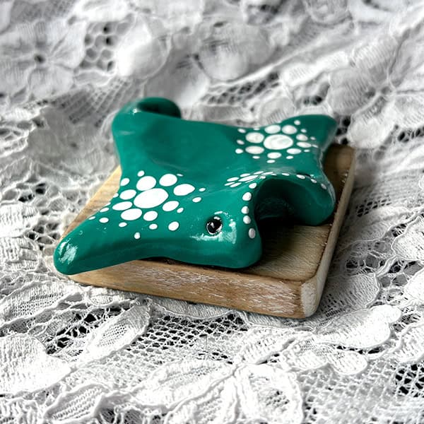 Manta ray worry stone in sea green with dot details