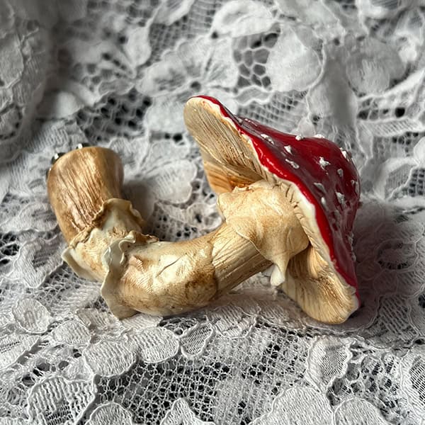 Handmade gifts from clay in the shape of a mushroom