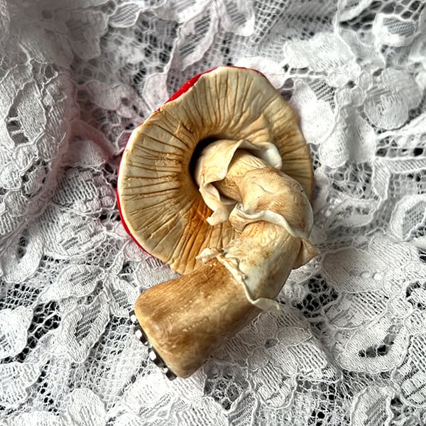 Handmade gifts from clay in the shape of a mushroom