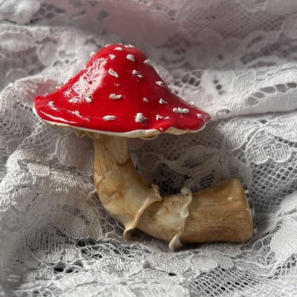 Handmade gifts from clay in the shape of a mushroom