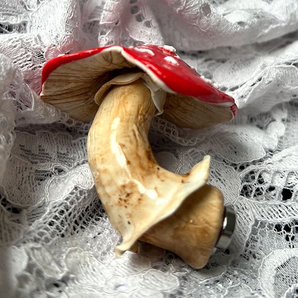 Handmade gifts from clay in the shape of a mushroom
